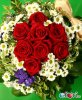 bouquet-di-fiori-corti-con-rose-rosse.178.big.jpg